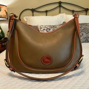 Vintage Dooney & Bourke Large Crescent Sac Hobo R83 in the color Old Gold